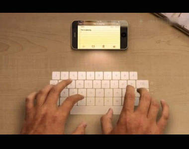 iPhone5雷射鍵盤投影  再造科技想像文