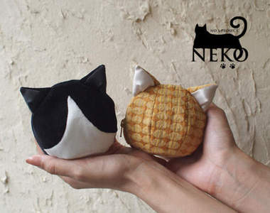 《喵的隨身用品》零錢通通由我來保管～耳機塞還是貓手手唷