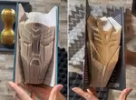 用書本摺出《變形金剛博派狂派標誌》造型好看而且效果十分立體 用書本摺出《變形金剛博派狂派標誌》造型好看而且效果十分立體
