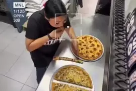 一位Pizza店女員工用誰也想不到的方式偷吃披薩 影片流出後網友直呼這根本天才